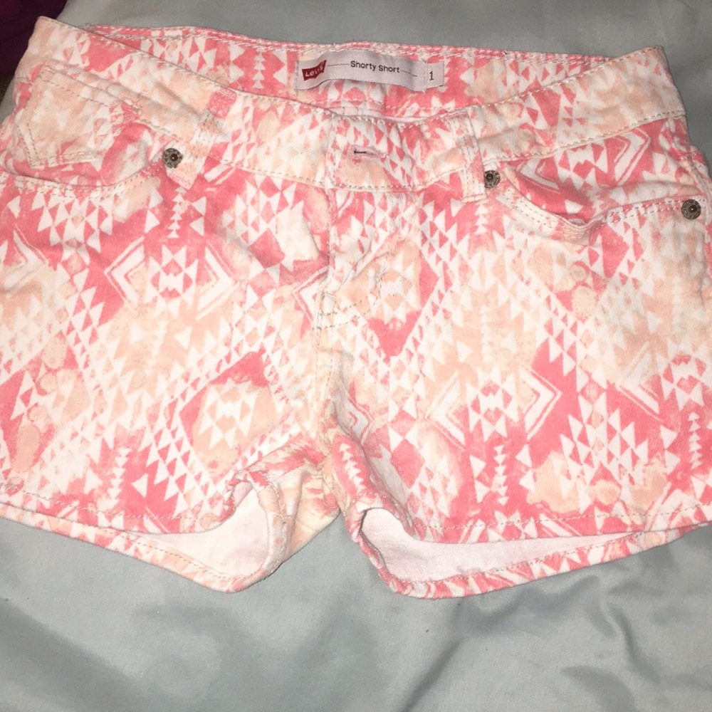 jean shorts with pink and white print